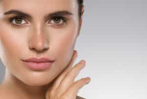 A close-up shot of a woman’s skin after microneedling treatments