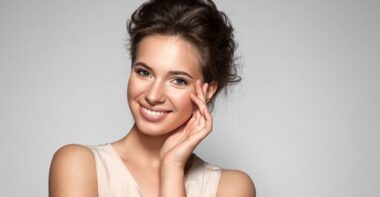 Portrait of young woman with perfect skin clean